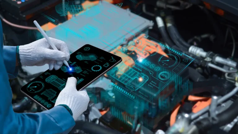 Auto mechanic using a tabletÂ wireless scanning tool to check the ECU engine system; automobile information displayed on a screen; mechanic working on cars at a garage